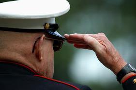 Old man doing salute
